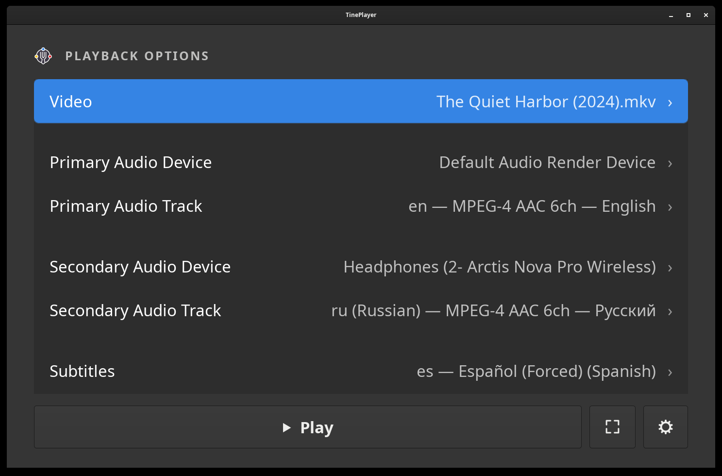 TinePlayer's playback options: English to the speakers, Russian to the headphones, and Spanish subtitles.